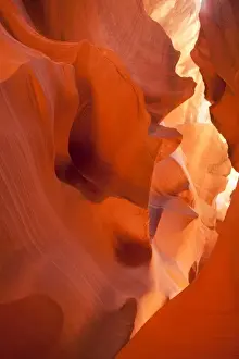 Images Dated 6th July 2009: USA, Arizona, Page, Sunlight filters down into carved red sandstone walls of Lower