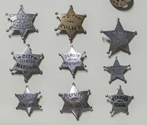 Shine Prints: USA, Arizona, Scottsdale. Close-up of law enforcement badges from wild west