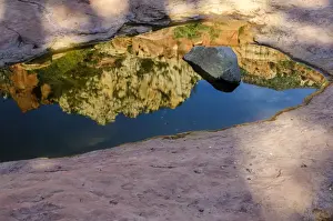 Images Dated 15th September 2012: USA, Arizona, Sedona. Autumn reflection on pool of water