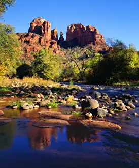USA, Arizona, Sedona, Cathedral Rock reflecting in Oak Creek