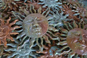 Images Dated 10th July 2017: USA, Arizona, Sedona, Metal enamel suns for sale