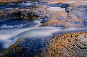 Images Dated 15th September 2012: USA, Arizona, Sedona. Reflections on water flowing over rock