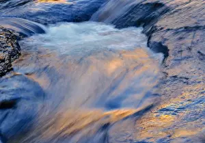 Images Dated 15th September 2012: USA, Arizona, Sedona. Reflections on water flowing over rock