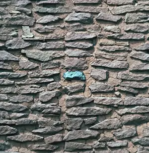 Precious Prints: USA, Arizona, Wupatki Pueblo. A turquoise is embedded in the wall of a ruin in Wupatki