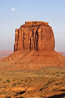 USA, AZ, Navajo Reservation, Full Moon Rising Over Merrick Butte in Monument ValleyTribal