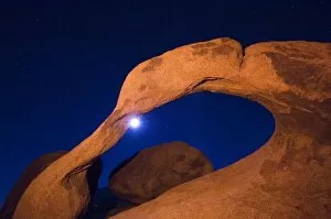 Images Dated 10th October 2005: USA, California, Alabama Hills Night photo with colored flash of rock arch and moon