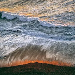 Monterey County Prints: USA, California, Big Sur. Breaking surf catches the late fiery light of sunset