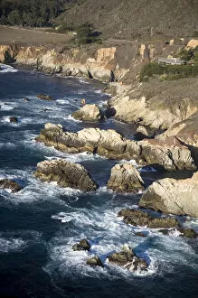 USA. California. Big Sur. Ragged and rough cliffs drop down to the sweeping coastline