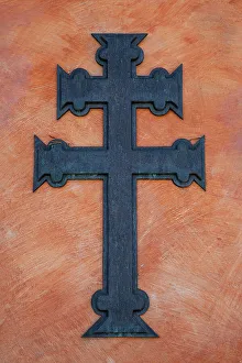 Mission Prints: USA, California, Carmel. Inside the grounds at the Carmel Mission Basilica Museum cross against wall