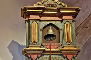 Bell Prints: USA, California, Carmel. Inside the grounds at the Carmel Mission Basilica Museum metal bell