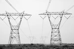 USA, California. Converging transmission towers and power lines USA, California. Converging transmission towers and power lines