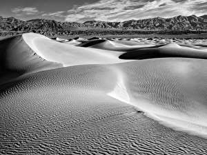 Stovepipe Wells Prints: USA, California, Death Valley National Park, Morning sun hits Mesquite Flat Dunes