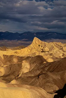 Images Dated 12th August 2020: USA, California, Death Valley National Park. Clearing storm over sandstone formations