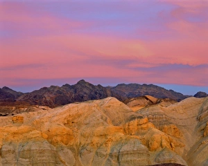 Striated Prints: USA, California, Death Valley NP. Sunset colors the sky with vibrant pink and purple