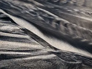Blur Prints: USA, California, Encinitas, Black-and-white abstract of water flowing on beach
