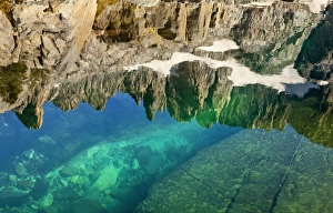 USA, California, Inyo National Forest. The Minarets reflected in Iceberg Lake. Credit as