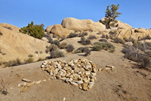 Images Dated 2nd April 2012: USA, California, Joshua Tree National Park. Stones arranged as arrow through heart