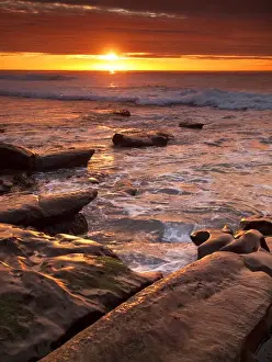 Images Dated 28th December 2009: USA, California, La Jolla, Sunset over tide pools at Coast Blvd. Park