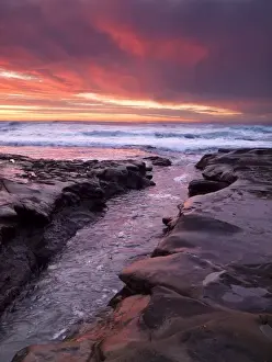 Images Dated 28th December 2009: USA, California, La Jolla, Sunset over tide pools at Coast Blvd. Park