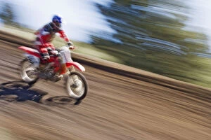 Images Dated 19th June 2005: USA, California, Mammoth Lakes. Blur of motocross racer