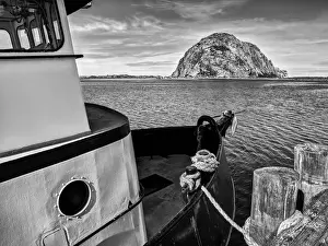 Images Dated 27th March 2012: USA, California, Morro Bay, Fishing boat pointing at Morro Rock