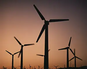 Palm Springs Prints: USA, California, Palm Springs, View of silhouetted wind turbines at sunset