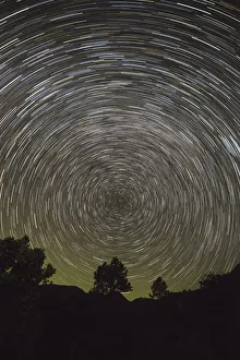 Prints of USA, California, Pine Valley. Star trails of the Milky Way galaxy. Credit as: Christopher Talbot Frank / Jaynes Gallery / DanitaDelimont Images Dated 2018 June: USA, California, Pine Valley. Star trails of the Milky Way galaxy