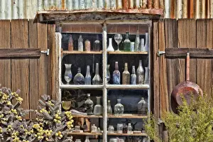 Bottle Prints: USA, California, Randsburg. Bottles in window of abandoned store