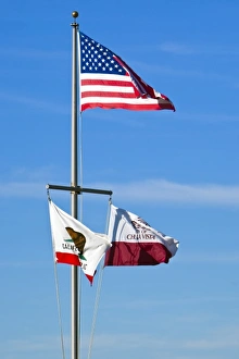 Images Dated 27th December 2008: USA, California, San Diego, Chula Vista. Federal, state, and local flags fly on flagpole