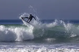 Images Dated 25th January 2014: USA, California, San Diego. Surfer catching air at Cardiff by the Sea