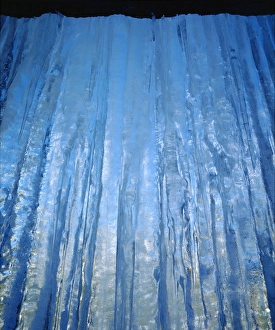 USA, California, Sierra Nevada Mountains. aInside a frozen Waterfall
