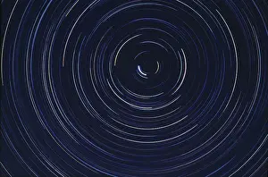 Astronomy Prints: USA, California, Star Trail. A long exposure catches the trail of stars in Death