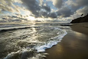 Christopher Talbot Frank Prints: USA, California, Sunset Cliffs Park. Wave on beach at sunset