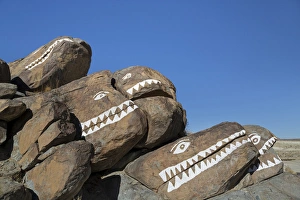 Teeth Prints: USA, California, Trona Pinnacles. Rocks painted with crocodile faces