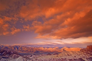 Images Dated 12th October 2007: USA, California. View from Zabriske Point of Death Valley National Parkstorm clouds at sunrise