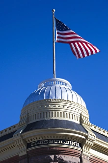 Skiing Prints: USA, Colorado, Aspen, Elks Building and US flag