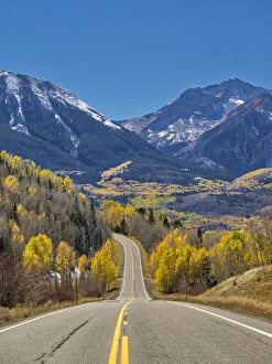 Images Dated 5th August 2020: USA, Colorado. An empty Colorado highway 145 in midday surrounded by fall color near