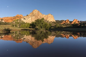 Images Dated 21st September 2013: USA, Colorado, Colorado Springs. Sandstone cliff reflected in pond