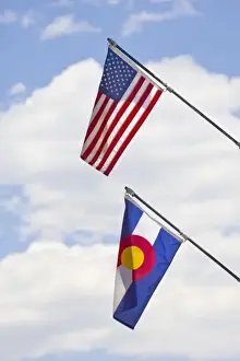 Parade Prints: USA, Colorado, Frisco. American and Colorado state flags fly in July Fourth paradeFred J