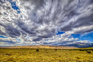 Images Dated 24th September 2018: USA, Colorado, Great Sand Dunes National Park and Preserve. Landscape of plain and dunes
