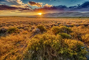 Images Dated 24th September 2018: USA, Colorado, Great Sand Dunes National Park and Preserve. Sunset over dunes and plain