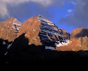 Early Light Prints: USA, Colorado, Maroon Bells. Both the early light and striations of snow enhance Maroon Bells