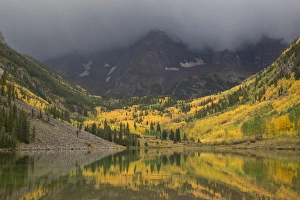 Images Dated 22nd September 2014: USA, Colorado, Maroon Bells State Park. Autumn storm clouds on Maroon Bells mountains
