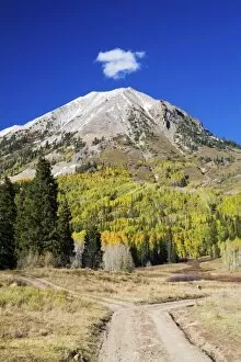 Images Dated 26th September 2006: USA, Colorado, Mt. Crested Butte, Fork in the Country Backroad with Mountain in Background