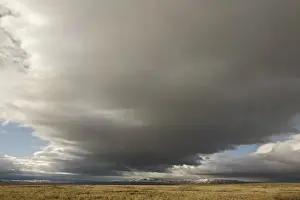 USA, Colorado, North Park. Storm clouds sweep across plain. Credit as: Don Grall