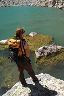 Images Dated 4th September 2006: USA, Colorado, Rocky Mountains, Indian Peaks Wilderness. A female hiker at a mountain lake