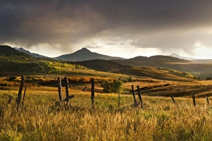 Images Dated 30th September 2011: USA, Colorado, San Juan Mountains. Landscape and fence at sunset