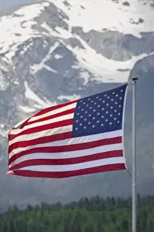 Images Dated 29th June 2008: USA, Colorado, Silverthorne. American flag flying against mountain backdrop