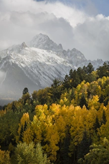 Images Dated 1st October 2014: USA, Colorado, Sneffels Range. Snow clouds over Mt Sneffels at sunset. Credit as