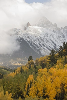 Images Dated 1st October 2014: USA, Colorado, Sneffels Range. Snow clouds over Mt Sneffels at sunset. Credit as